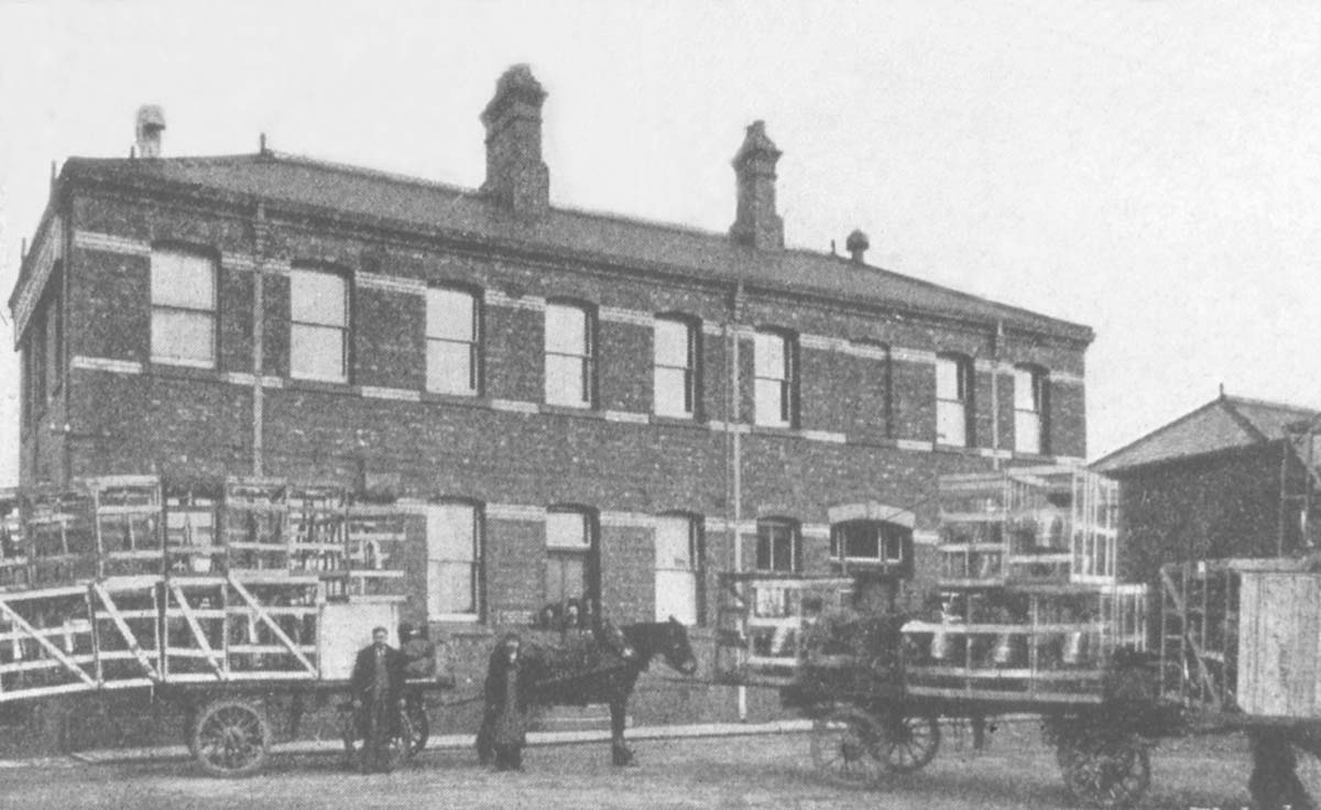 View of horse-drawn vehicles bringing a delivery of bicycles to Warwick Road goods yard for dispatching to all over the UK