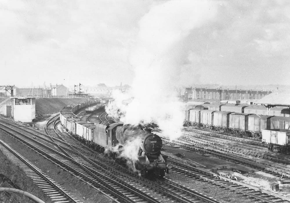 Ex-LMS 2-8-0 8F No 48753 is seen coming off Nuneaton branch with a southbound coal train circa 1960