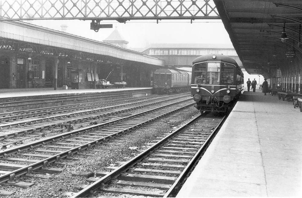 View of a newly introduced DMU standing on the down platform whilst one of the last Push-Pull trains stands at the up platform