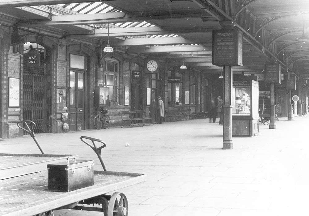 A later view of Coventry station's concourse on the up platform with the Refreshment Room to the right of the exit