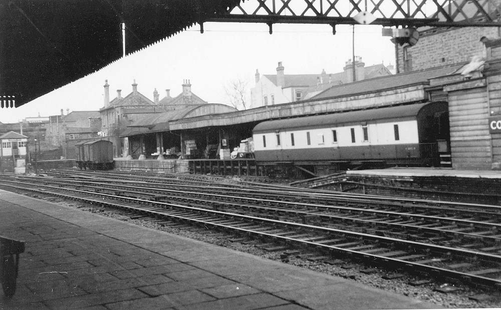 Looking from the down platform towards the ramshackled parcels bay with a 57 ft Brake Van on the right and Coventry No 2 Signal box on the left