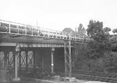 View of the road bridge constructed with steel beams which carried Lythall Lane over Three Spires Junction