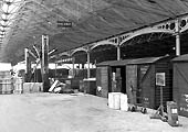 Interior view of the warehouse at Curzon Street's showing different types of general goods being unloaded