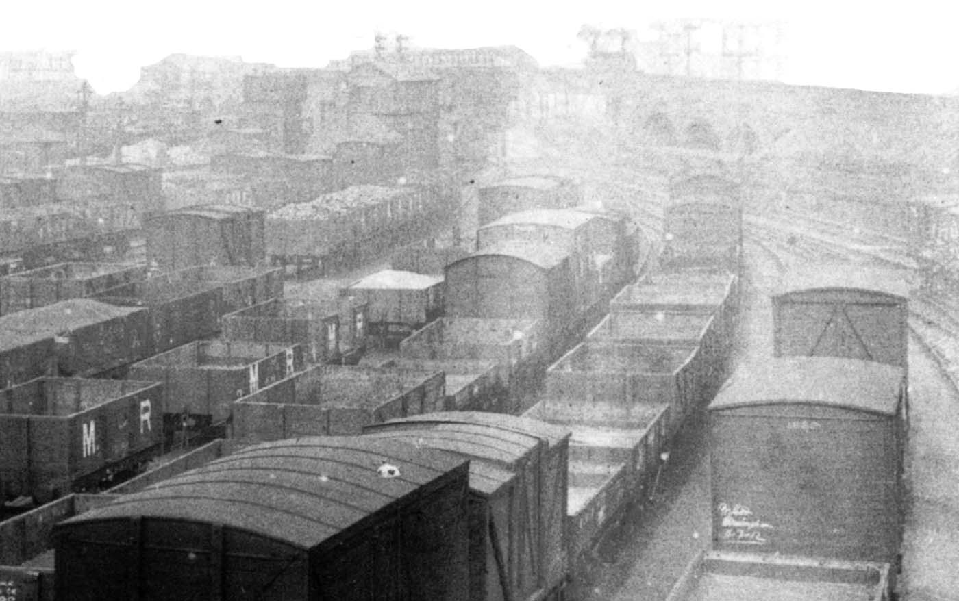 Close up showing Curzon Street No 1 signal cabin and a LNWR train standing on Vauxhall viaduct