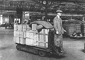 A LNWR electric trolley being used to transfer packing cases of seed potatoes on 25th September 1928