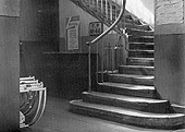 View of the foot of the main staircase between the columns on the ground floor within Hardwick's building