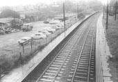 Looking along the Halt towards Coventry from Sandy Lane bridge on a wet summer's day on 1st June 1964