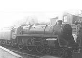 British Railways Standard Class 5MT 4-6-0 No 73003 is standing at the up platform with a local passenger service to Coventry