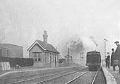 Looking towards Nuneaton as an unidentified LNWR Webb 2-4-2T Radial tank runs in to the station at the head of a local passenger service