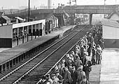 View of the Foleshill station's down platform filled with factory workers commuting to all stations along the branch to Nuneaton