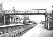 Looking towards Nuneaton from the Coventry end of Foleshill station's up platform with the 1931 erected footbridge in the foreground