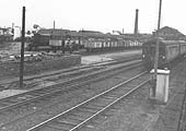 A view of Foleshill goods yard taken from the Signal cabin as a Nuneaton bound DMU approaches