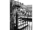 The station's gate adjacent to the ornemental footbridge on the down platform was only used to handle the large number of factory workers employed locally