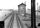 Looking towards Coventry from the cab of a DMU with Gibbet Hill Signal Cabin sited between the passing loop