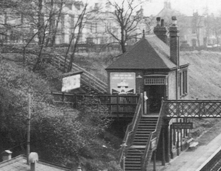 Close up showing the two storey brick building which accommodated the booking office on the first floor