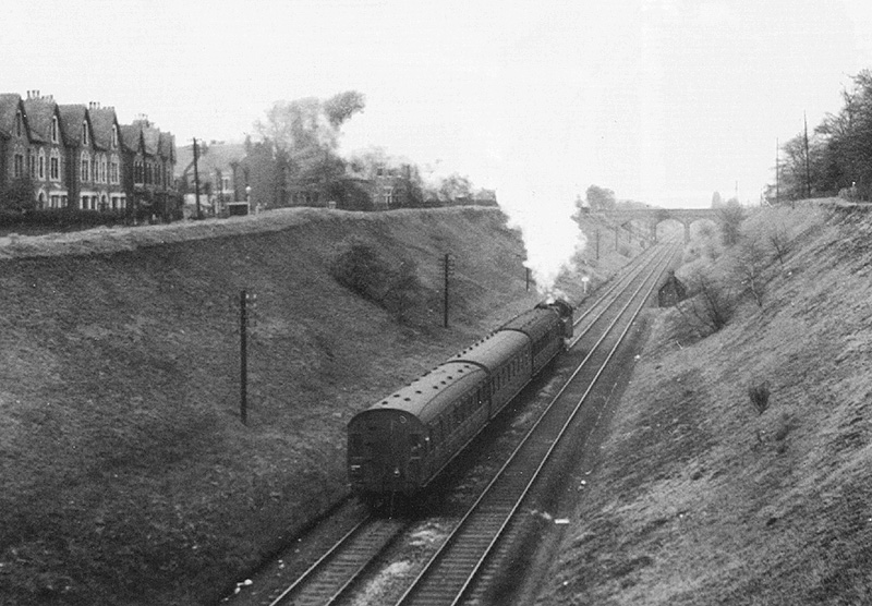 Ex-LMS 2-6-2T No 40122 is seen running bunker first on a New Street to Sutton Coldfield local passenger service