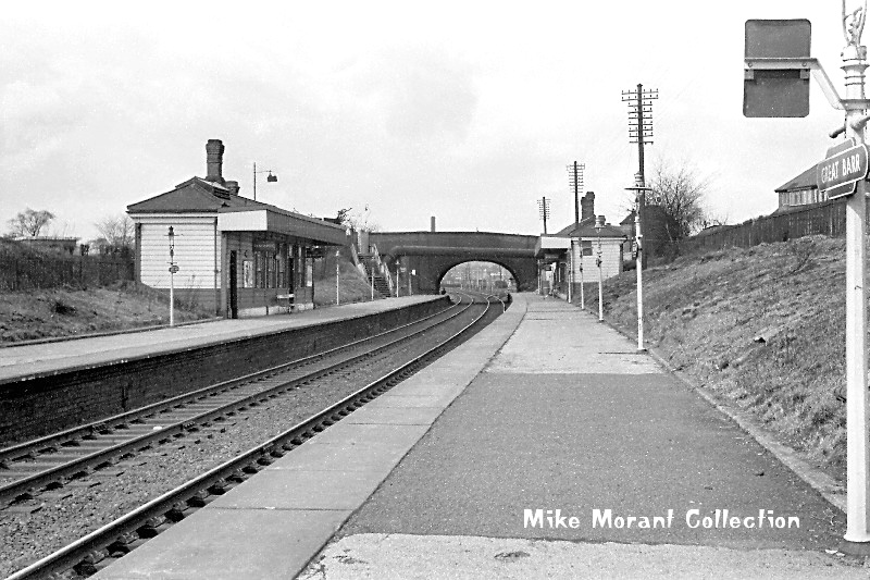 Looking along the up platform towards Bescot with the overbridge carrying the Old Walsall Road at the end