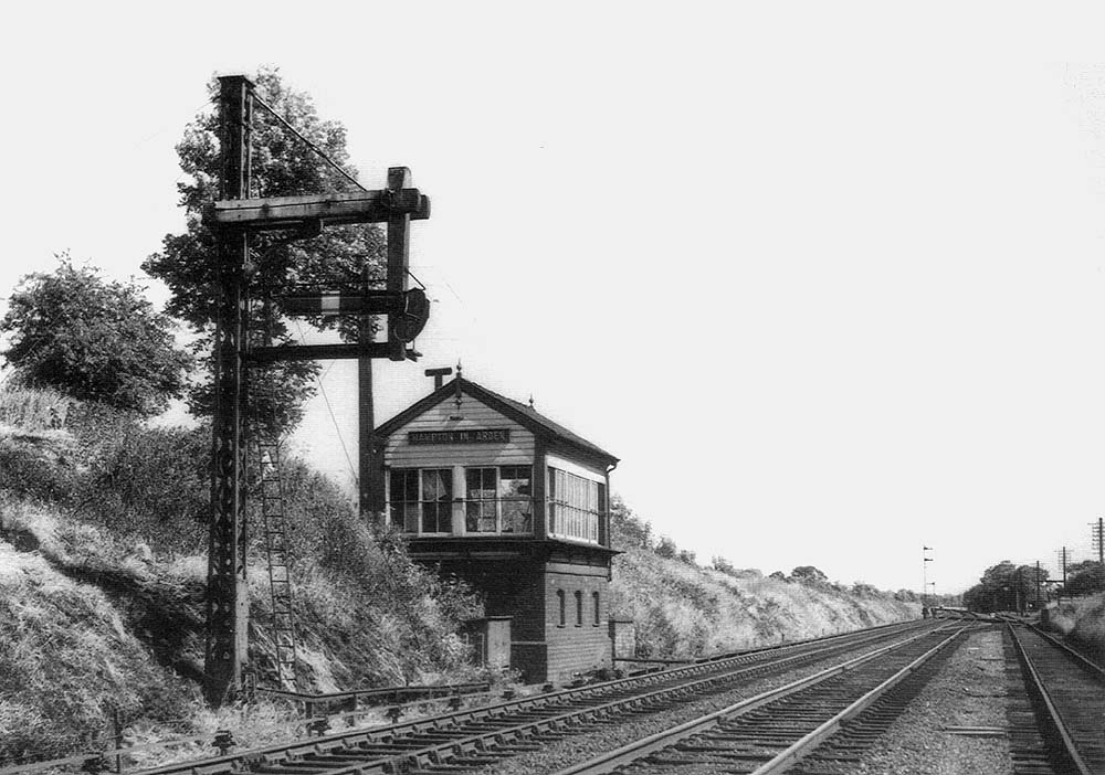Looking towards Berkswell station with Hampton in Arden goods yard seen in the distance on the right on 27th June 1961