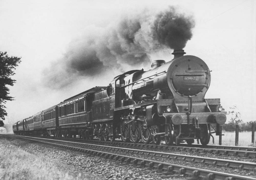 LMS 5XP 4-6-0 Patriot class No 5902 'Sir Frank Ree' is seen at the head of one of the famed two-hour express services that ran between Birmingham and Euston