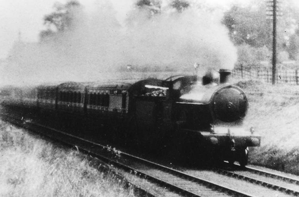 LNWR 3P 4-4-0 Precursor class No 811 'Express' is seen on a down express to Wolverhampton near Hampton in Arden