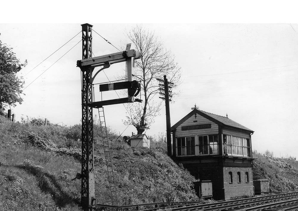 View looking towards Coventry showing the signal box which stood mid-way between the up and down connections a little to the north of the goods yard