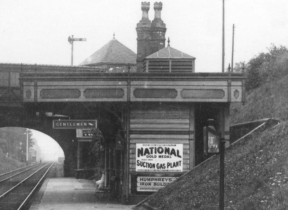 Close up showing the up platform building showing how the building was recessed into the bank and that this end was constructed in timber