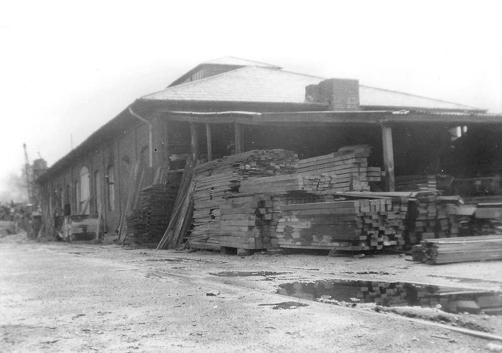 View of the former Birmingham and Derby Junction Railway locomotive shed now being used as a store for a timber merchant