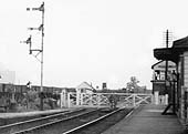 Close up showing beyond the crossing, Hawkesbury Lane sidings on the left and the signal box which opened in 1896 on the right