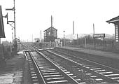 Looking towards Coventry from the Nuneaton end of the station's short up platform with the sidings on the left opposite the signal box