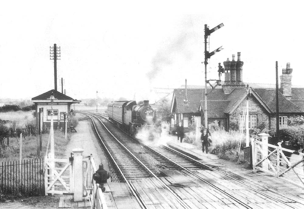 British Railways built 3MT Ivatt 2-6-2T No 41214 arrives at the station on a Nuneaton to Coventry service during September 1958