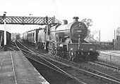 LMS 4P 4-4-0 'Compound' No 1157 is seen passing through Kenilworth whilst at the head of an up semi-fast express service on 28th August 1936