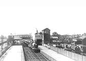 An unidentified ex-LNWR 3P 4-4-0 Precursor class locomotive is seen passing through Kenilworth station whilst at the head of an excursion working