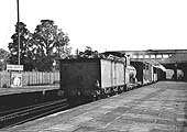 Ex-Midland Railway 2F 0-6-0 No 3347 is seen running tender first as it passes through Kenilworth station on an up pick goods service