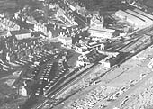 Close up of Kenilworth station and yards with some thirty coal wagons alone standing in the Coal Yard which lies nearest to the camera