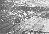 A 1959 aerial view of Kenilworth showing the station in the centre, Waverley Road on the left and the closed Whitemoor Brickworks