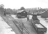A 1959 view of Kenilworth station's goods yard with the goods shed in the centre and the weighbridge office and  stables on the right