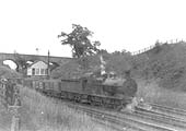 View of an unidentified ex-Midland Railway 3F 0-6-0 locomotive coming off the Berkswell branch whilst at the head of an up coal train