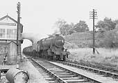 Ex-LMS 8F 2-8-0 No 48751 heads a Type 8 working from the North Warwickshire coalfields past Kenilworth Junction