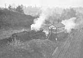 Ex-LMS 8F No 48407 is seen with an engineer�s train standing 'wrong road' on the Up Kenilworth Line