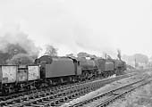 BR 9F 2-10-0 No 92216 and ex-LMS 5MT 4-6-0 No 44772 accelerate away from Kenilworth Junction