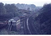 An unidentified Sulzer Type 4 'Peak' Diesel locomotive passes Kenilworth Junction Signal Cabin on a coal train on 6th May 1969