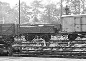 Close up showing post-Second World War wagons and vans in transit between the former LNWR and the GWR routes