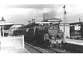 Ex-LMS 6P5F 2-6-0 'Crab' No 42944 is seen standing at platform two at the head of a local Leamington to Coventry service