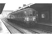 A Birmingham built by Birmingham Railway Carriage and Wagon  two-coach Diesel Multiple Unit on a Leamington to Nuneaton local service is seen standing at platform two