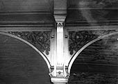 Detail view of one of the many ornate cast iron brackets supporting Leamington Avenue station's platform canopy
