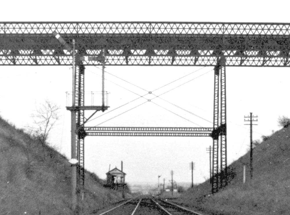 Close up of Honingham Hill Road bridge showing the LMS upper quadrant signals that protected Marton junction