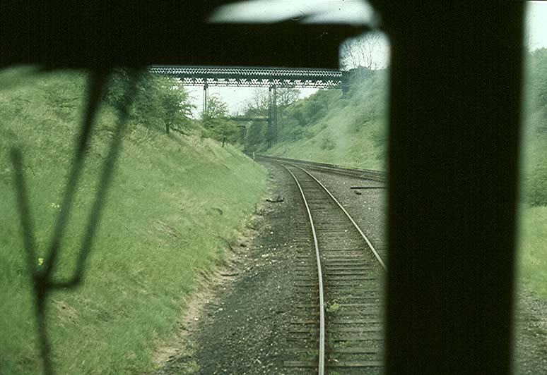 One of four photos showing D25 265 at the head of wagons being delivered and returned from Southam Cement Works in March 1982