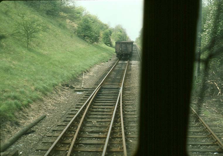 One of four photos showing D25 265 at the head of wagons being delivered and returned from Southam Cement Works in March 1982