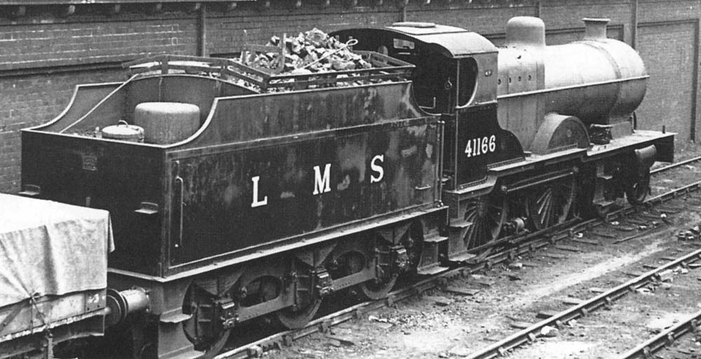 Ex-LMS 4P 4-4-0 Compound No 41166 is seen standing alongside the shed on 3rd July 1948