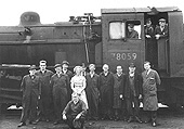 British Railways 4MT 2-6-0 No 78059, the last engine to work off Nuneaton shed, is seen with a number of shed staff before it leaves the shed for the last time